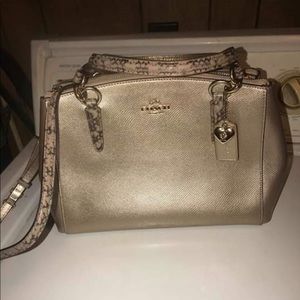 Coach gold metallic exotic trim